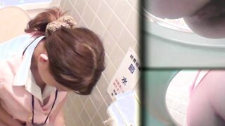 Japanese women piss in a bathroom with an up close camera