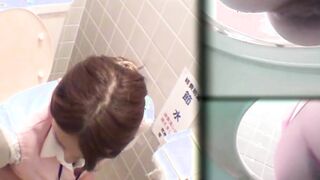 Japanese women piss in a bathroom with an up close camera