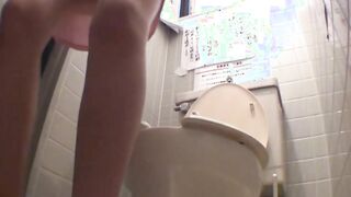 Japanese women piss in a bathroom with an up close camera