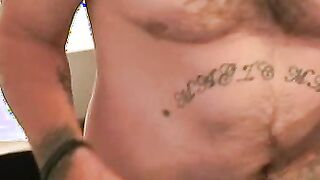 Radically tattooed older amateur masturbates in the bedroom
