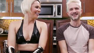 Blond guy submits to blonde MILF femdom indoors