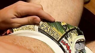 Muscular stud stroking his dick solo style in some undies
