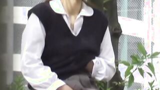 Japanese schoolgirl touching herself before peeing outside