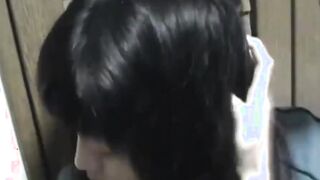 Delightful Japanese chick sits on the latrine and pees in a cup