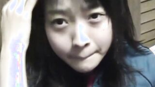 Delightful Japanese chick sits on the latrine and pees in a cup