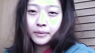 Delightful Japanese chick sits on the latrine and pees in a cup