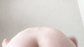Young homosexual guy grabs his big cock and a butt plug