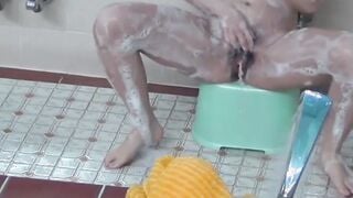 Playful Japanese chicks filmed pissing while taking a shower