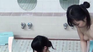 Playful Japanese chicks filmed pissing while taking a shower