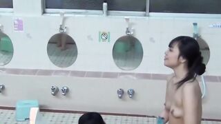 Playful Japanese chicks filmed pissing while taking a shower