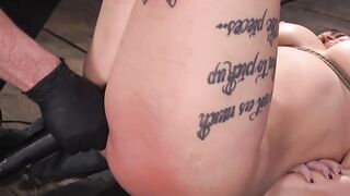 Tattooed bound slave fucked ith dildo on a stick