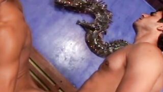 Tattooed hunk from Brazil moans and chokes on big hard cock