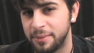 Amateur twink with shaggy hair plays with his dick solo