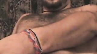 Amateur twink with shaggy hair plays with his dick solo