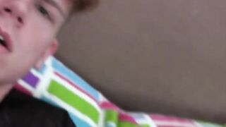 Cute homosexual guy masturbates and cums on himself solo