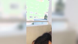 Big Tits Ebony Sucks BBC in a Public Balcony