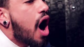 Two men in suits have sex in the toilet at work