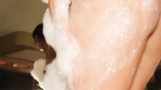 Dazzling ladyboy flaunting body in erotic washing meeting