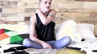 Inked twink jerks off and dildos his ass until he cums severely