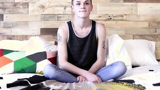 Inked twink jerks off and dildos his ass until he cums severely