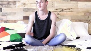 Inked twink jerks off and dildos his ass until he cums severely