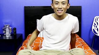 After an interview an Asian twink strips off her clothes and makes out