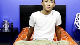 After an interview an Asian twink strips off her clothes and makes out