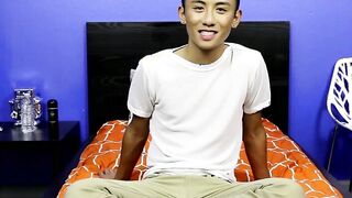 After an interview an Asian twink strips off her clothes and makes out