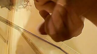 Long haired straightie strokes his hairy cock and cums