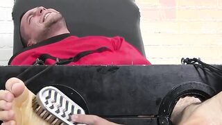 Bound dude with a mask on his face endures tickling torment