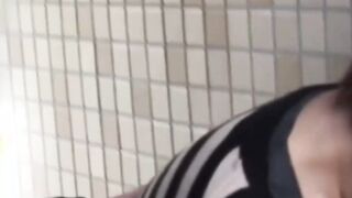 Young Japanese schoolgirl pisses herself in public for us