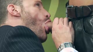 Office stud Landon Conrad gives office hunk Dato Foland a hard time