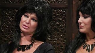Busty dominatrix whips bound MILF lesbian