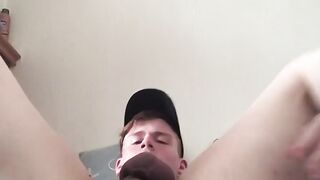 Pretty young twink jerks off and toys his big balls