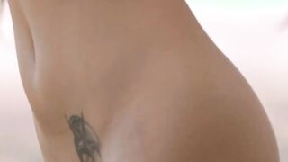 Erotic teasing with a young brunette with natural tits