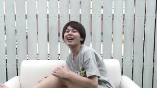 Japanese twink bends over for the cam and strokes his cock