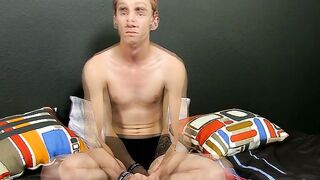 Masturbating while attending an interview is a tatted man with a hairy cock