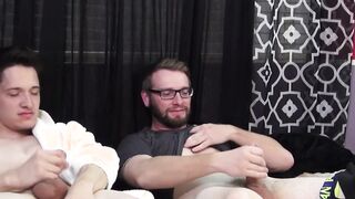 Two pals with droopy balls stroke off together and cum