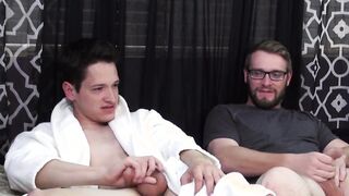 Two pals with droopy balls stroke off together and cum