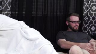 Two pals with droopy balls stroke off together and cum
