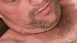 Mature lad with hairy chest and belly pulls his hard dick