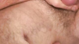 Mature lad with hairy chest and belly pulls his hard dick