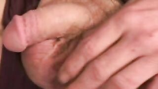 Mature lad with hairy chest and belly pulls his hard dick