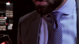 Businessmen with muscles banging after work hours