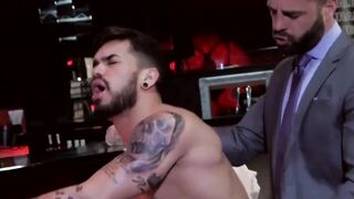 Businessmen with muscles banging after work hours