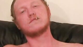 Redhead tugs his cut boner and tries his best to get hard