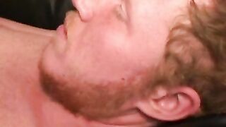 Redhead tugs his cut boner and tries his best to get hard