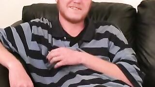Redhead tugs his cut boner and tries his best to get hard