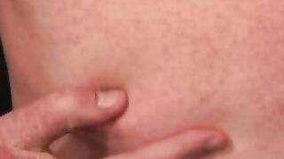 Redhead tugs his cut boner and tries his best to get hard