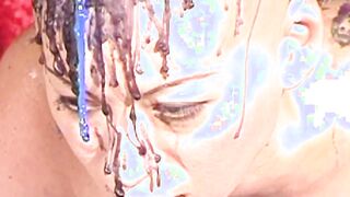 Bald babe restrained and tormented with hot wax in dungeon